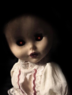 Vintage spooky doll